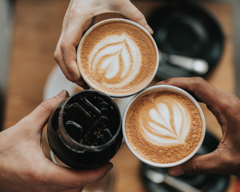 two hot coffees and an ice coffee